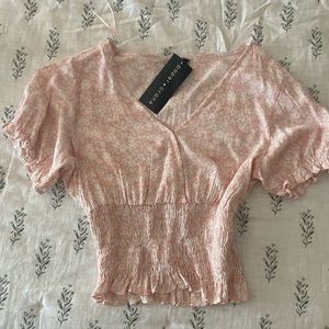 pink cropped blouse